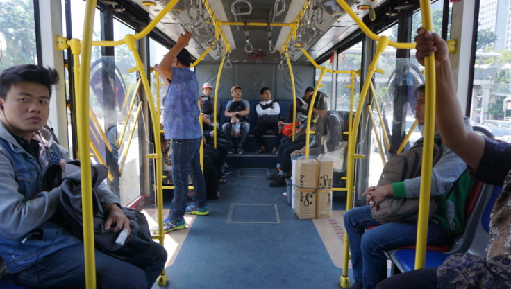 People riding bus