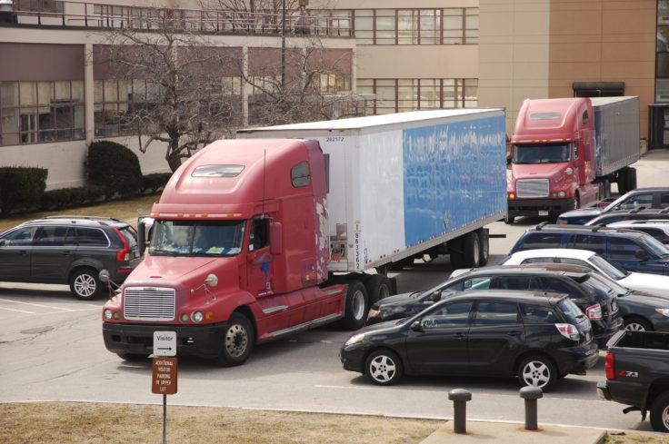 110330-F-AB000-359 Huge truck passing parking lot